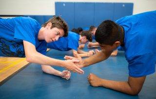 Boys doing exercise