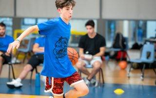 The boy playing basketball