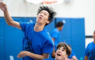 Boys playing basketball